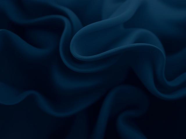 Abstract composition of flowing fabric with artistic lighting